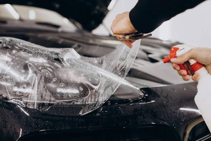 Applying paint protection film to a car
